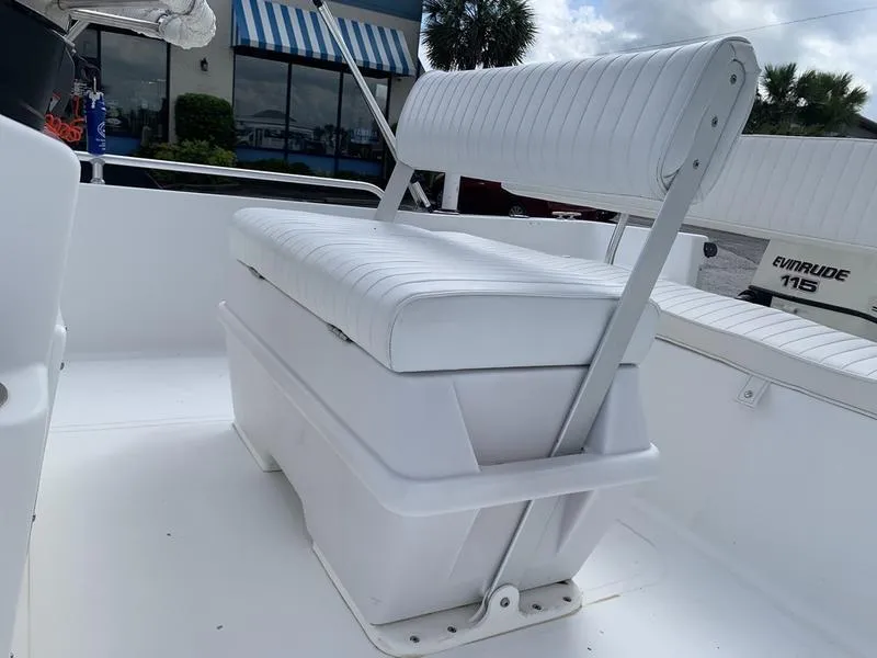 Slide: The Image of White seating on 2009 Sea King 198 Bay boat, featuring cushioned bench and backrest. - 11