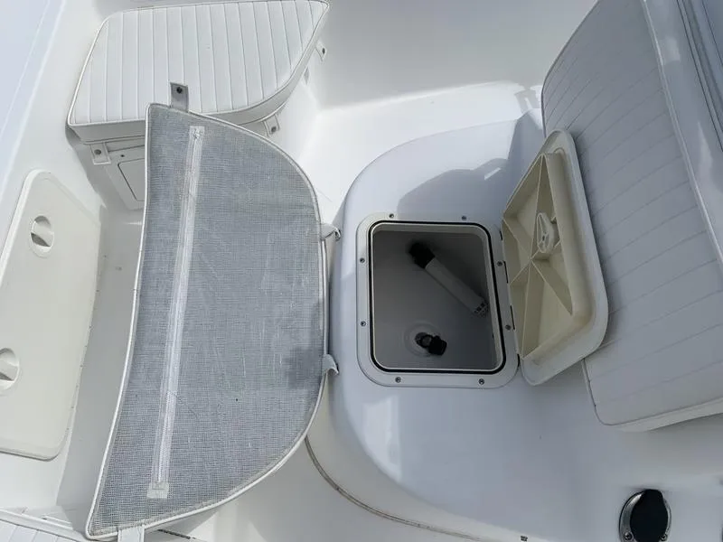 Slide: The Image of 2009 Sea King 198 Bay boat interior with open storage compartments. - 17