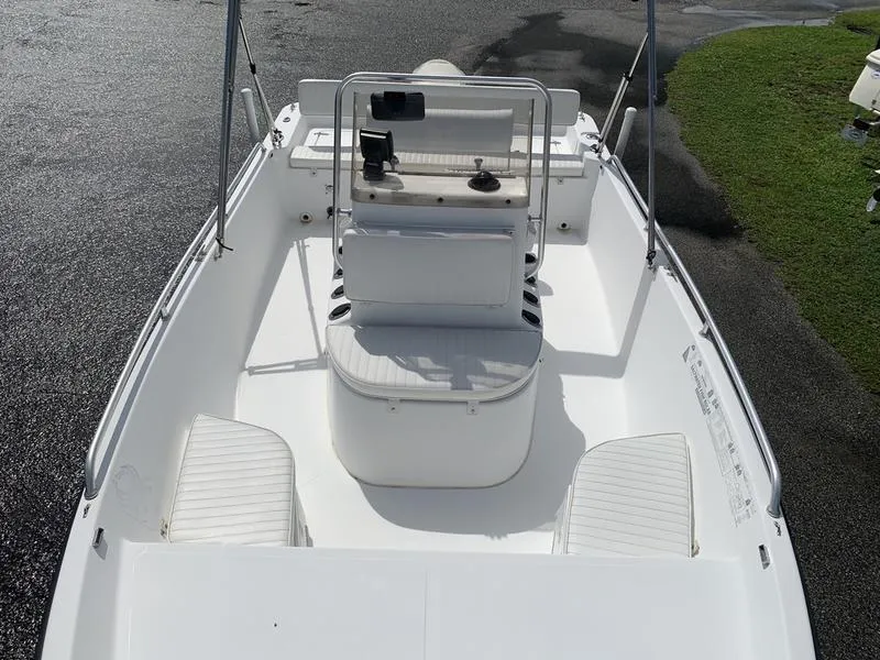 Slide: The Image of 2009 Sea King 198 Bay boat interior with seating and steering console. - 20
