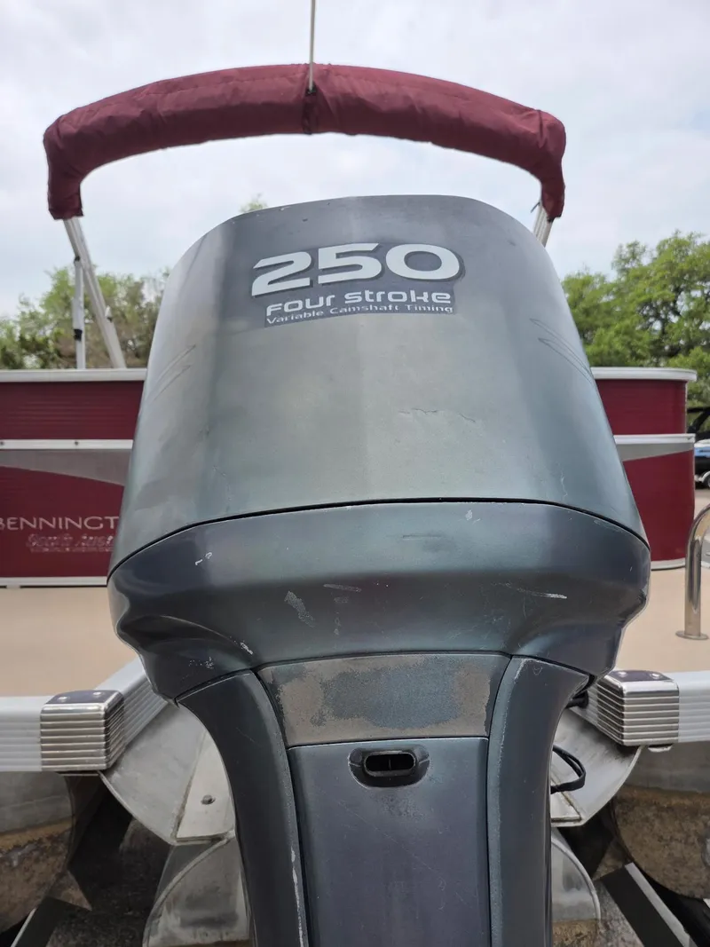 Slide: The Image of 2011 Bennington 2554GCW boat with 250 four-stroke engine, rear view. - 5