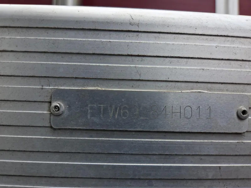 Slide: The Image of Hull identification number on a 2011 Bennington 2554GCW boat. - 7