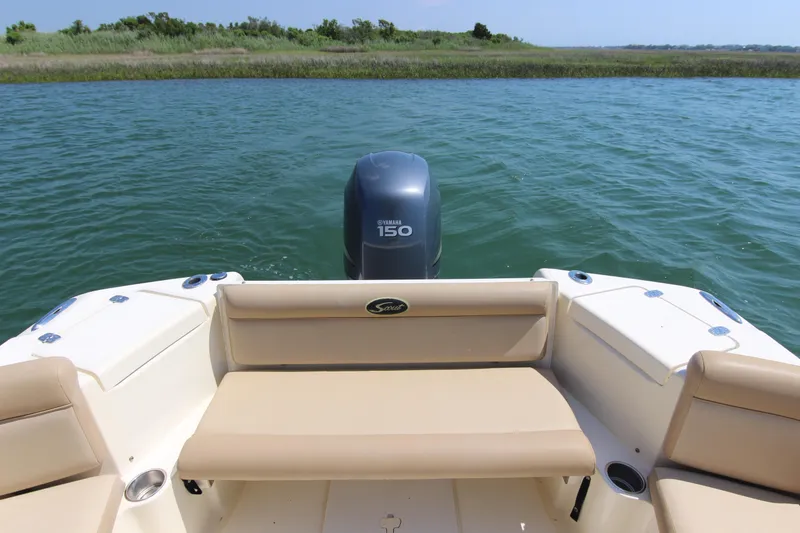 Slide: The Image of 2011 Scout 222 Sportfish boat with Yamaha 150 engine on calm water. - 22