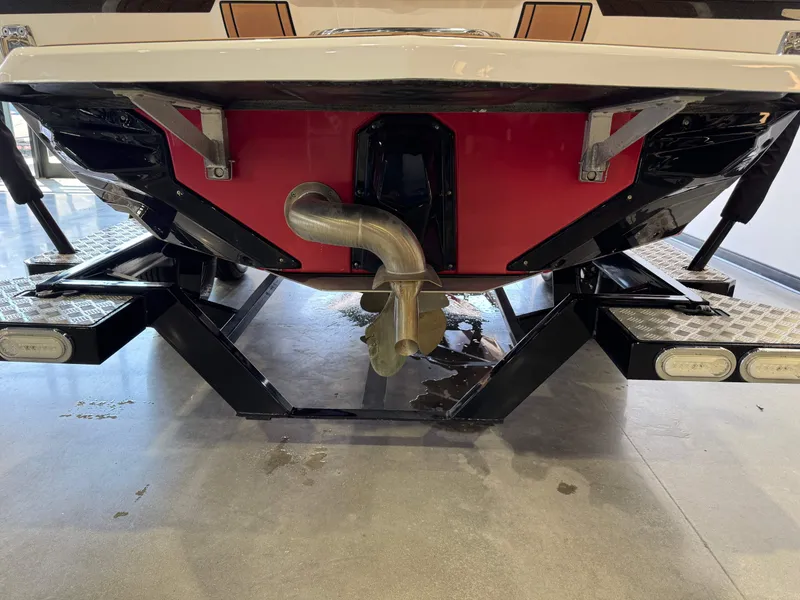 Slide: The Image of 2019 Nautique Super Air Nautique GS22 boat stern with propeller and exhaust system. - 7