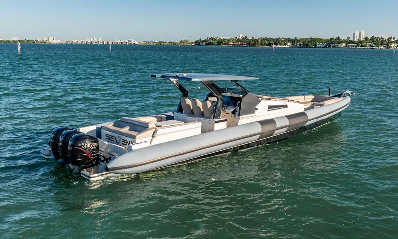 Slide: The Image of 2019 Chaser 500R boat on open water, featuring sleek design and powerful engines. - 1