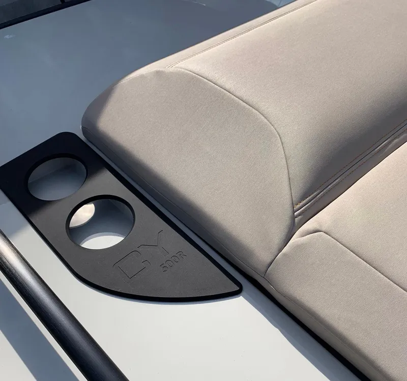 Slide: The Image of Cushioned seat on 2019 Chaser 500R with integrated cup holders. - 12