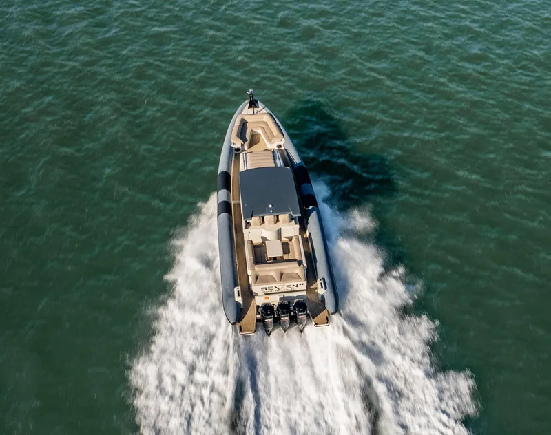 Slide: The Image of Aerial view of 2019 Chaser 500R boat speeding on water. - 15
