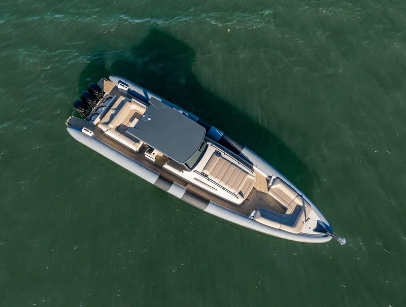 Slide: The Image of Aerial view of 2019 Chaser 500R boat cruising on open water. - 18