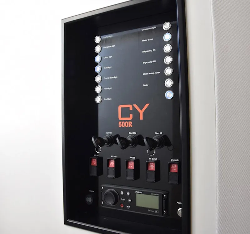 Slide: The Image of Control panel of 2019 Chaser 500R boat with switches and indicators. - 9