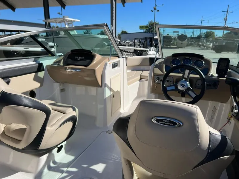 Slide: The Image of 2017 Chaparral H20 boat interior with steering wheel and seating. - 10