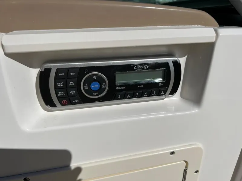 Slide: The Image of 2017 Chaparral H20 boat stereo system with Jensen Bluetooth controls. - 11