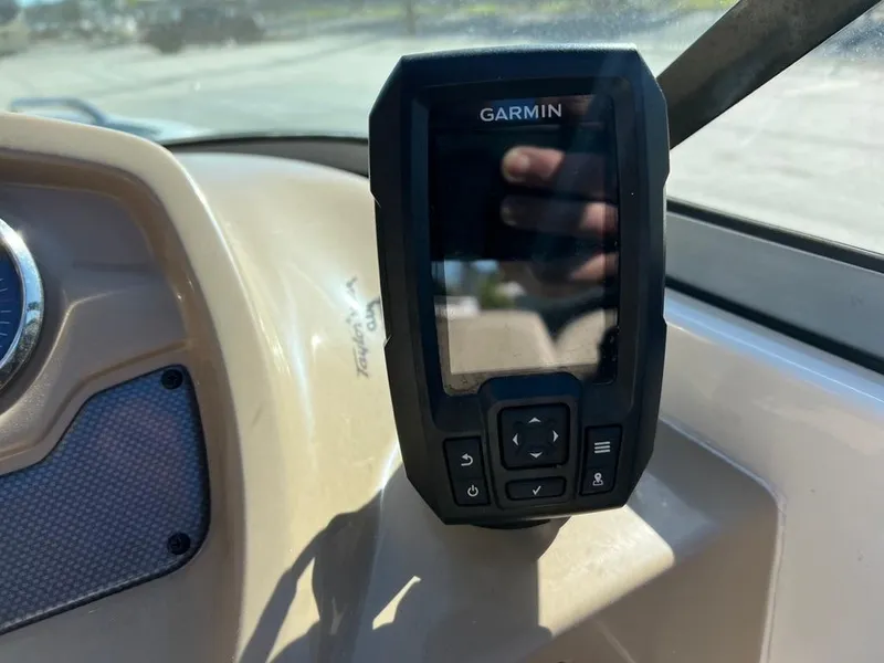 Slide: The Image of Garmin device mounted on 2017 Chaparral H20 dashboard, close-up view. - 16