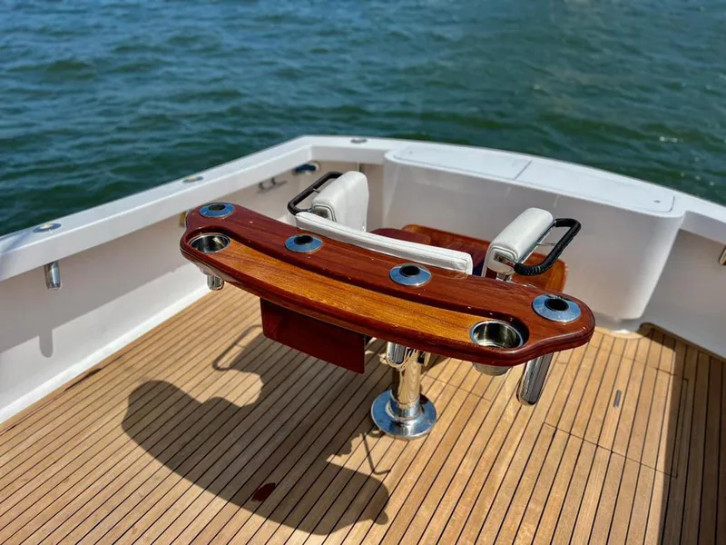 Slide: The Image of 1999 Gamefisherman 34 Express boat deck with wooden fighting chair, ocean view. - 22
