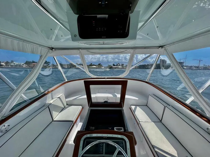 Slide: The Image of 1999 Gamefisherman 34 Express boat interior with panoramic water view. - 6