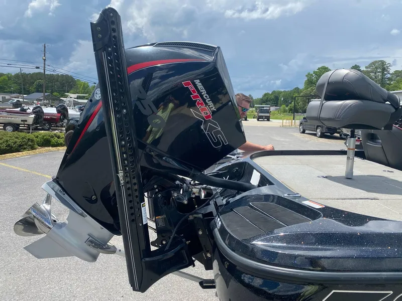 Slide: The Image of Nitro Z20 Pro 2022 boat with powerful Mercury Pro XS engine, parked outdoors. - 4