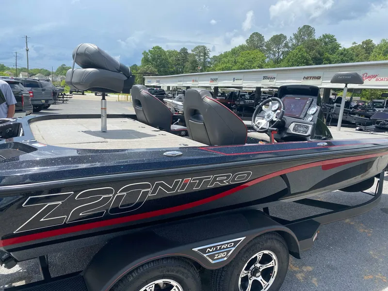 Slide: The Image of 2022 Nitro Z20 Pro boat with sleek design, parked outdoors on a trailer. - 5