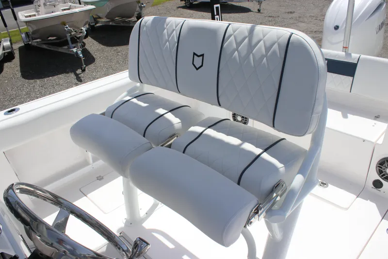 Slide: The Image of 2025 Sea Fox 268 Commander boat seating with white upholstery and diamond stitching. - 16