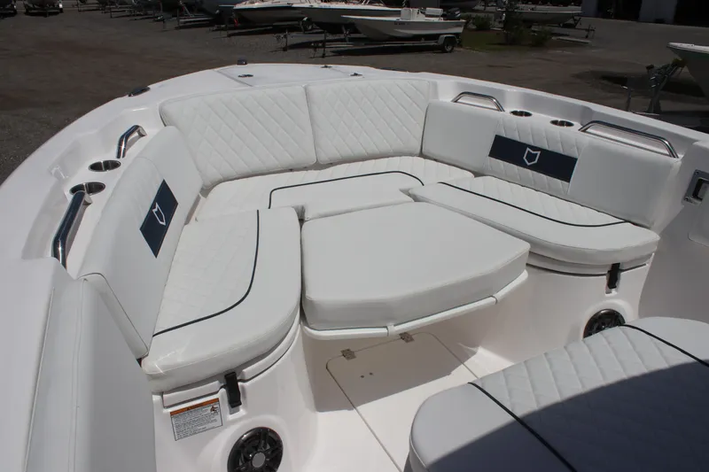 Slide: The Image of Luxurious seating area on 2025 Sea Fox 268 Commander boat, featuring white cushioned seats. - 26