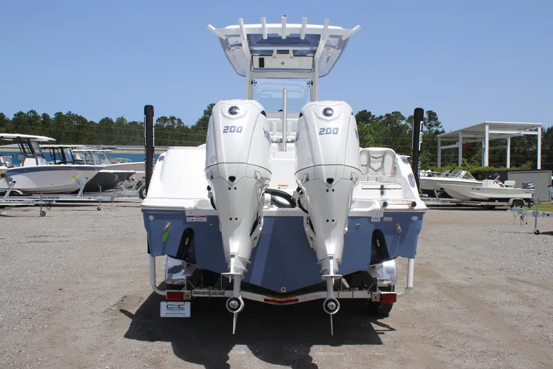 Slide: The Image of 2025 Sea Fox 268 Commander boat with dual 200 horsepower engines, rear view. - 3