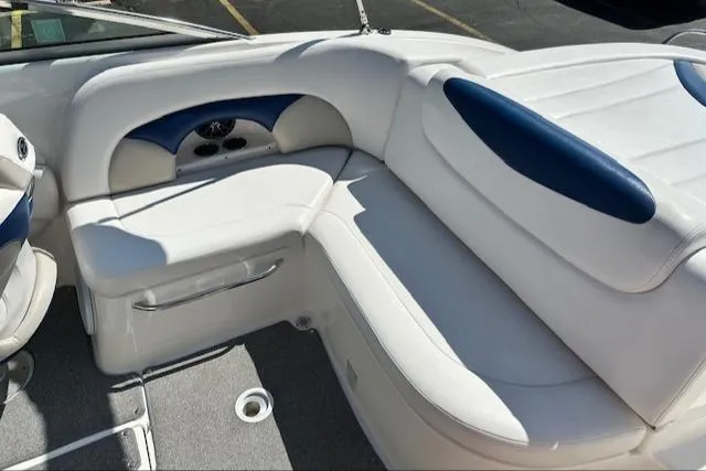 Slide: The Image of 2007 Chaparral SSX 236 boat interior with white and blue seating. - 12