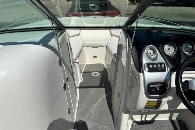 Slide: The Image of 2007 Chaparral SSX 236 boat interior with steering wheel and seating area. - 15