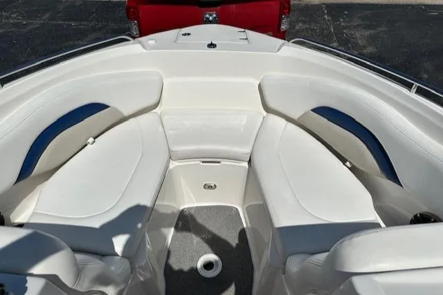 Slide: The Image of 2007 Chaparral SSX 236 boat interior with white seating and blue accents. - 17