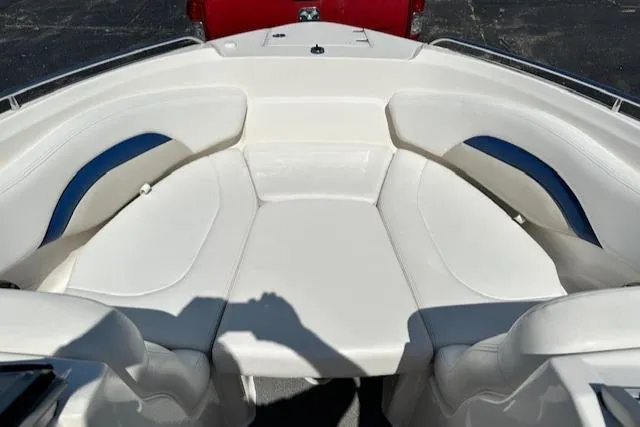 Slide: The Image of 2007 Chaparral SSX 236 boat interior with white and blue seating. - 18
