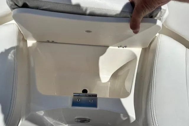 Slide: The Image of Open storage compartment in 2007 Chaparral SSX 236 boat seat. - 19
