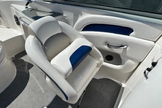 Slide: The Image of 2007 Chaparral SSX 236 boat interior with white and blue seating. - 25