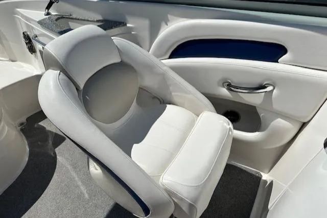 Slide: The Image of Luxury seating in 2007 Chaparral SSX 236 boat, featuring white upholstery and sleek design. - 26