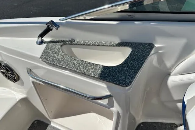 Slide: The Image of Interior view of 2007 Chaparral SSX 236 boat, featuring sleek design and modern amenities. - 27