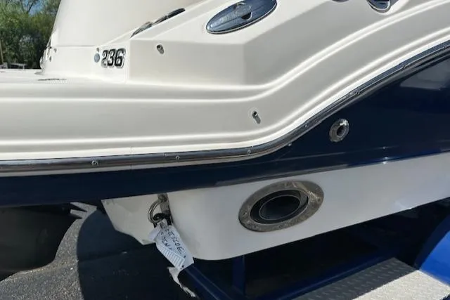 Slide: The Image of 2007 Chaparral SSX 236 boat detail, featuring sleek white and blue hull design. - 4