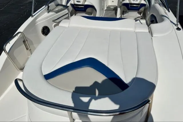 Slide: The Image of 2007 Chaparral SSX 236 boat interior with white and blue seating. - 8