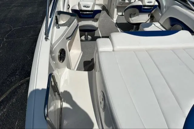 Slide: The Image of 2007 Chaparral SSX 236 boat interior with white and blue seating. - 9