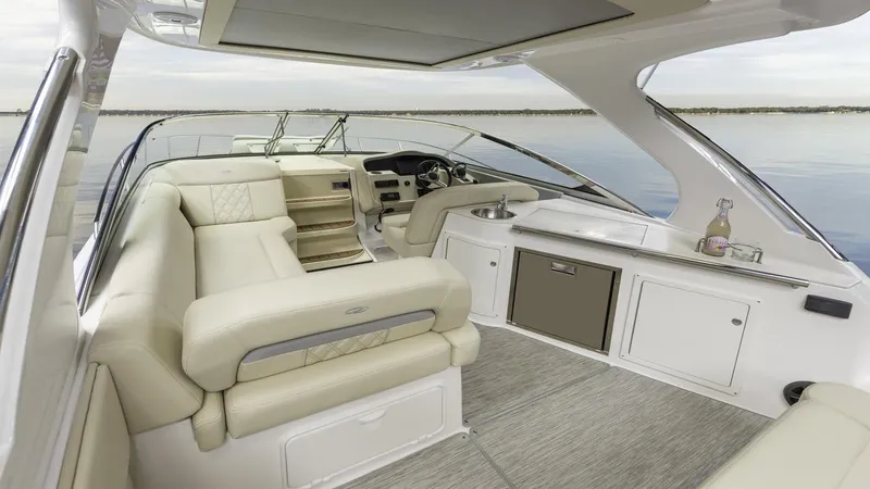 Slide: The Image of Luxurious interior of 2026 Regal 33 XO yacht with elegant seating and modern amenities. - 21