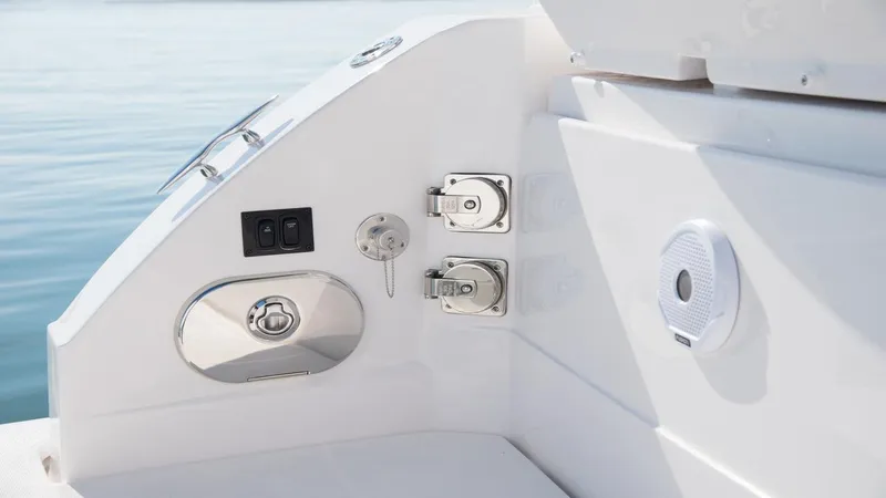 Slide: The Image of 2026 Regal 33 XO boat interior with sleek controls and speaker system. - 8