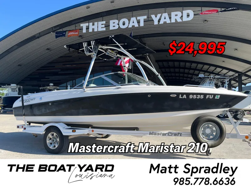 Slide: The Image of 2004 MasterCraft 210 Maristar boat for sale at The Boat Yard, priced at $24,995. - 1