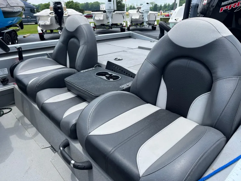 Slide: The Image of 2022 Vexus AVX189 boat interior with gray and white cushioned seats. - 13