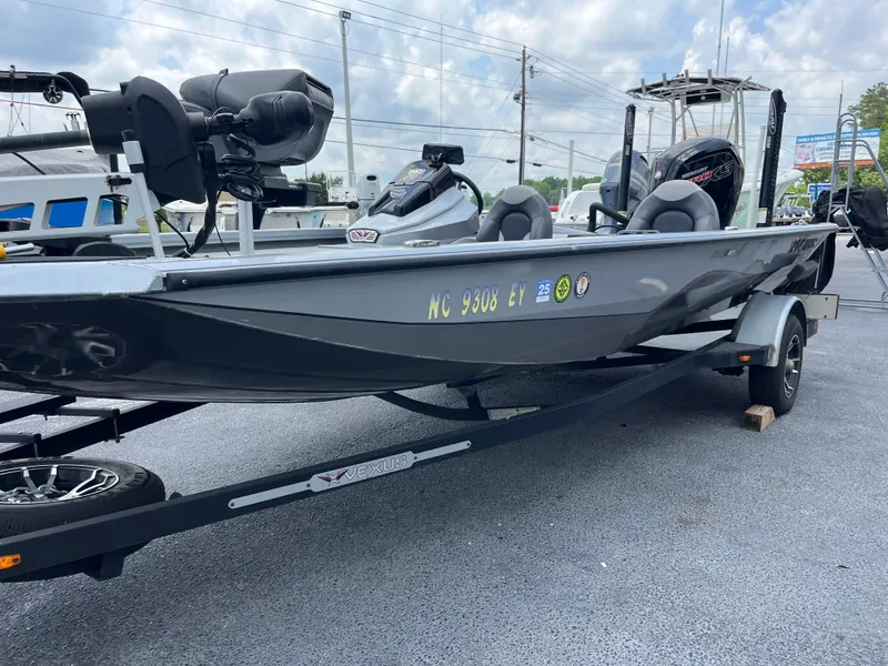 Slide: The Image of 2022 Vexus AVX189 boat on trailer, parked outdoors, side view. - 5