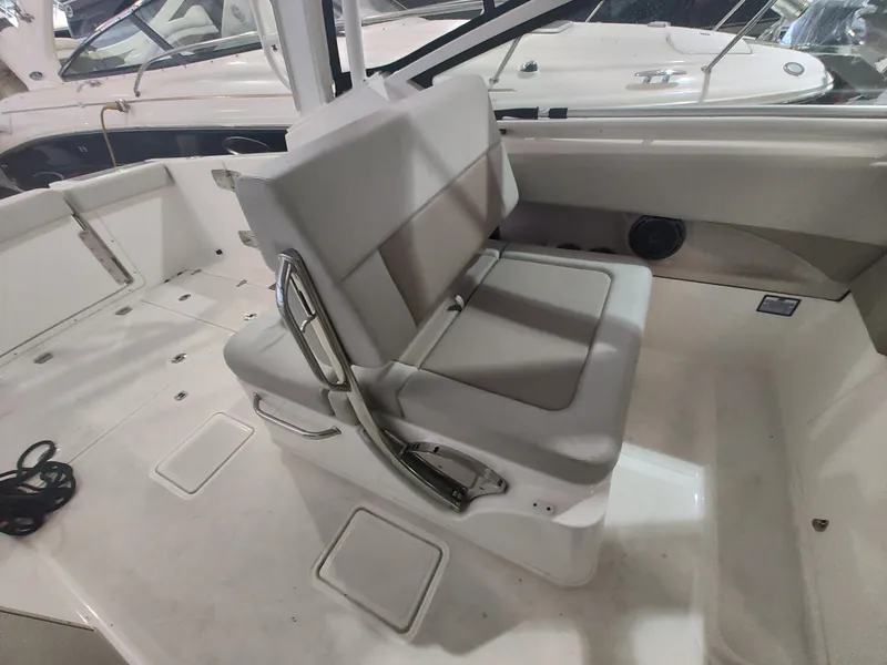 Slide: The Image of 2021 Boston Whaler 280 Vantage interior seating area with modern design and comfortable upholstery. - 15