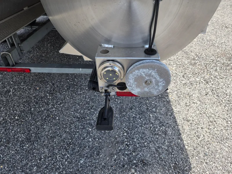 Slide: The Image of Rear view of a 2022 Barletta Corsa 23U pontoon boat on a trailer. - 17