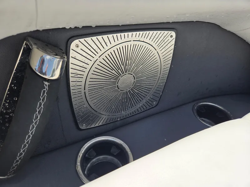 Slide: The Image of Interior of 2022 Barletta Corsa 23U with stylish speaker and cup holders. - 2