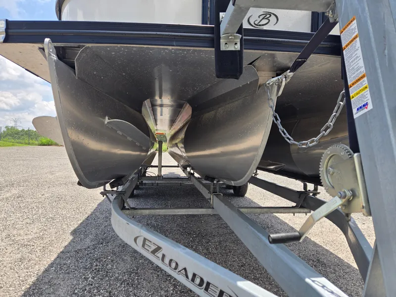 Slide: The Image of 2022 Barletta Corsa 23U pontoon boat on EZ Loader trailer, rear view. - 22