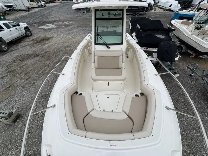 Slide: The Image of 2019 Boston Whaler 250 Outrage boat with spacious seating and sleek design. - 11