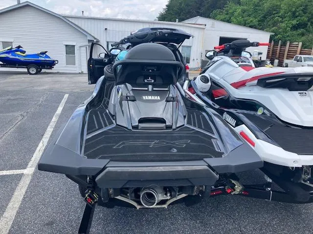 Slide: The Image of 2021 Yamaha WaveRunner VX Deluxe jet ski parked outdoors. - 12