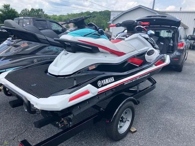 Slide: The Image of 2021 Yamaha WaveRunner VX Deluxe on trailer, parked outdoors. - 3