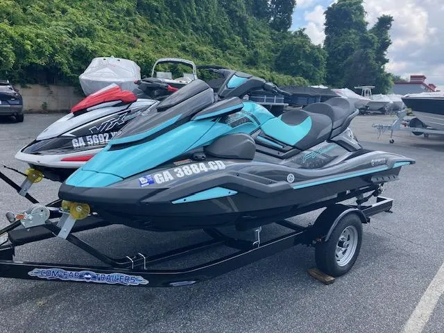 Slide: The Image of 2021 Yamaha WaveRunner VX Deluxe jet ski on trailer, parked outdoors. - 9