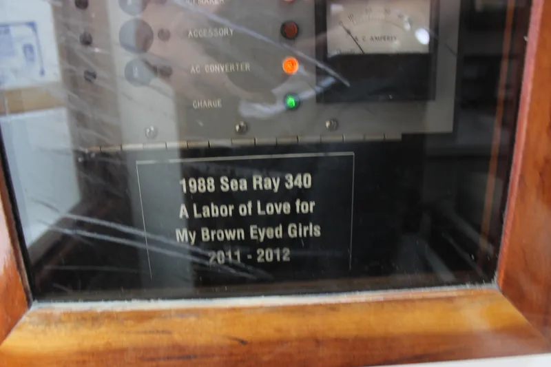Slide: The Image of Plaque on 1988 Sea Ray 340 Sundancer, dedicated to "Brown Eyed Girls," 2011-2012. - 30