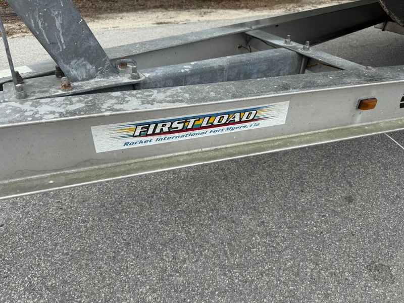 Slide: The Image of Trailer with "First Load" sticker, Edgewater 265CC, 2006 model. - 16