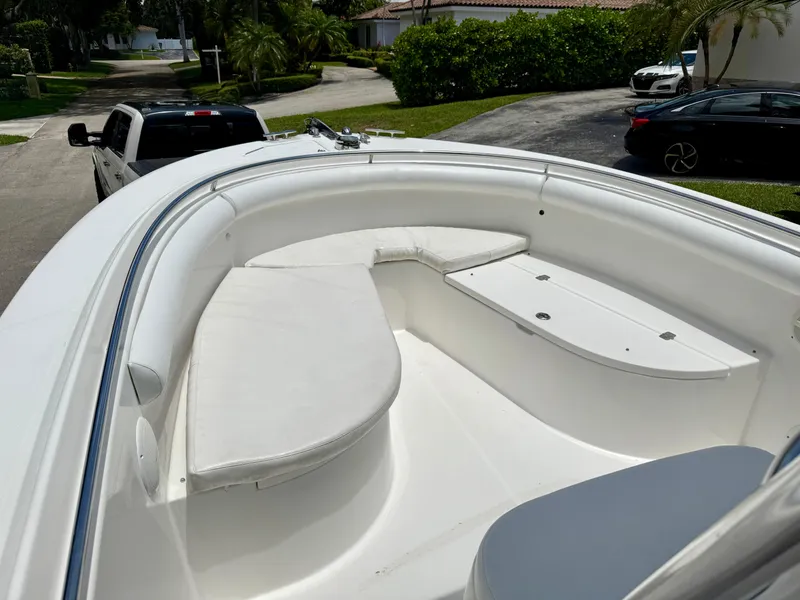 Slide: The Image of 2006 Edgewater 265CC boat with spacious seating and sleek design. - 4