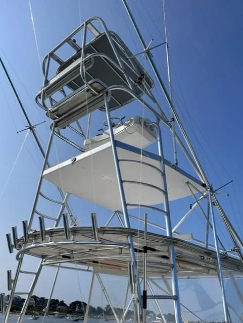 Slide: The Image of Stolper 38 boat tower, 2004 model, with clear blue sky background. - 25